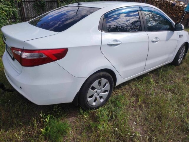 Білий Кіа Ріо, об'ємом двигуна 1.4 л та пробігом 265 тис. км за 5713 $, фото 9 на Automoto.ua