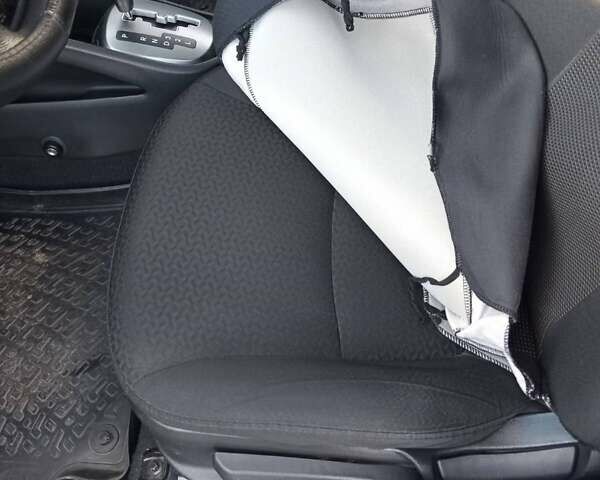 Білий Кіа Ріо, об'ємом двигуна 1.4 л та пробігом 87 тис. км за 8000 $, фото 3 на Automoto.ua