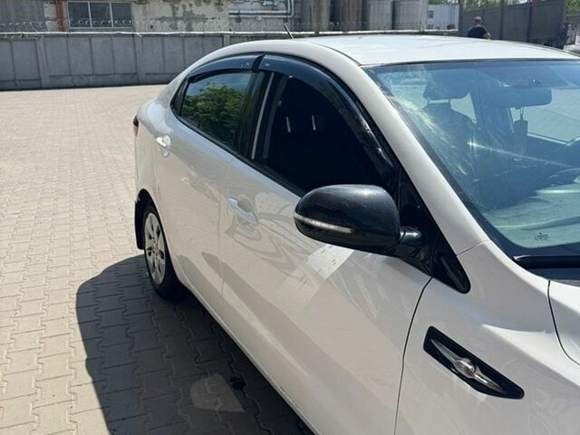 Білий Кіа Ріо, об'ємом двигуна 1.4 л та пробігом 221 тис. км за 5999 $, фото 3 на Automoto.ua