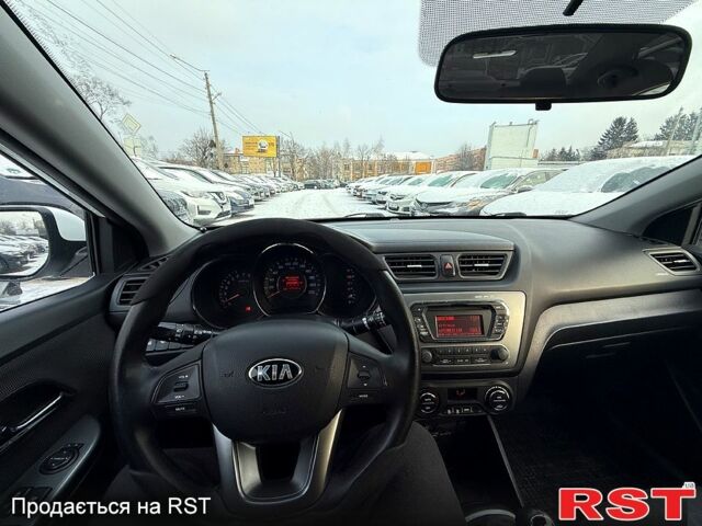 Білий Кіа Ріо, об'ємом двигуна 1.6 л та пробігом 14800 тис. км за 7800 $, фото 11 на Automoto.ua