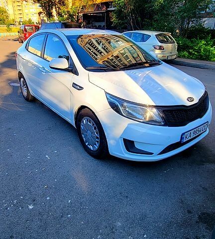Білий Кіа Ріо, об'ємом двигуна 1.4 л та пробігом 232 тис. км за 7450 $, фото 1 на Automoto.ua