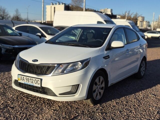 Белый Киа Рио, объемом двигателя 1.4 л и пробегом 212 тыс. км за 6999 $, фото 1 на Automoto.ua