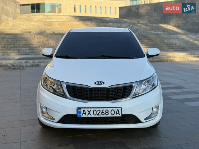Белый Киа Рио, объемом двигателя 1.4 л и пробегом 185 тыс. км за 6700 $, фото 1 на Automoto.ua