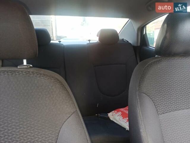 Белый Киа Рио, объемом двигателя 1.4 л и пробегом 156 тыс. км за 6300 $, фото 3 на Automoto.ua