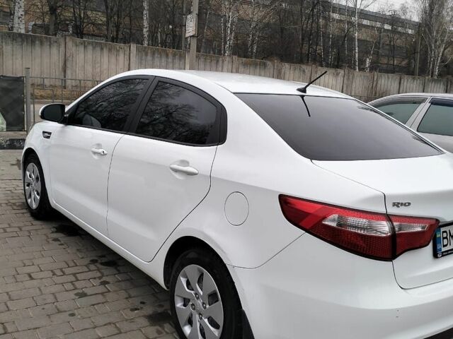 Білий Кіа Ріо, об'ємом двигуна 1.4 л та пробігом 84 тис. км за 8200 $, фото 15 на Automoto.ua