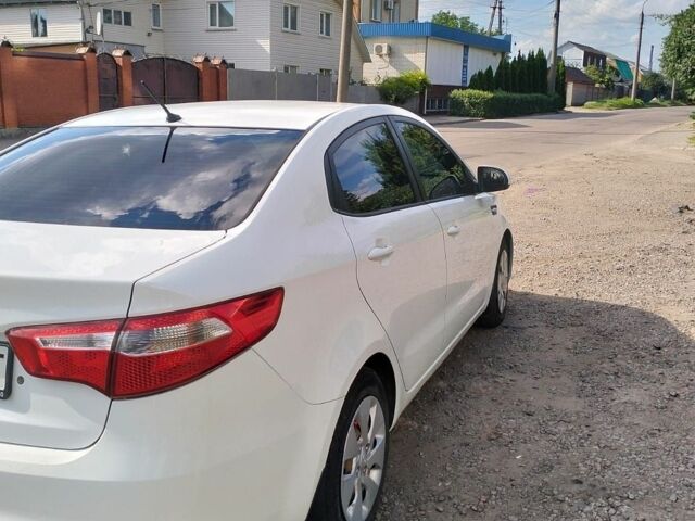 Білий Кіа Ріо, об'ємом двигуна 1.4 л та пробігом 84 тис. км за 8200 $, фото 8 на Automoto.ua