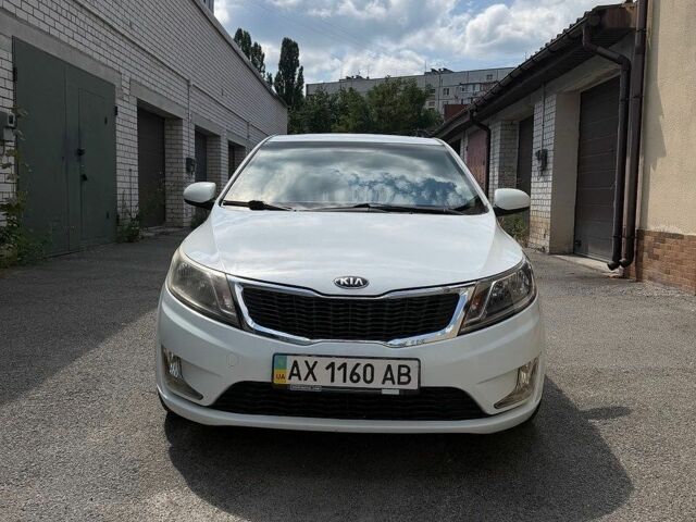 Белый Киа Рио, объемом двигателя 1.4 л и пробегом 143 тыс. км за 9199 $, фото 2 на Automoto.ua