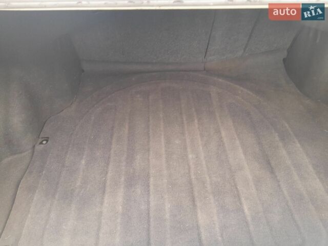Білий Кіа Ріо, об'ємом двигуна 1.59 л та пробігом 150 тис. км за 7500 $, фото 8 на Automoto.ua