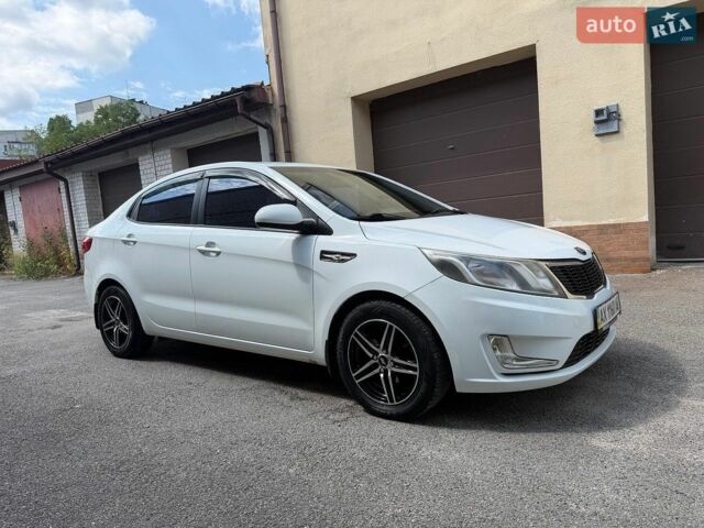 Белый Киа Рио, объемом двигателя 1.4 л и пробегом 143 тыс. км за 9199 $, фото 4 на Automoto.ua
