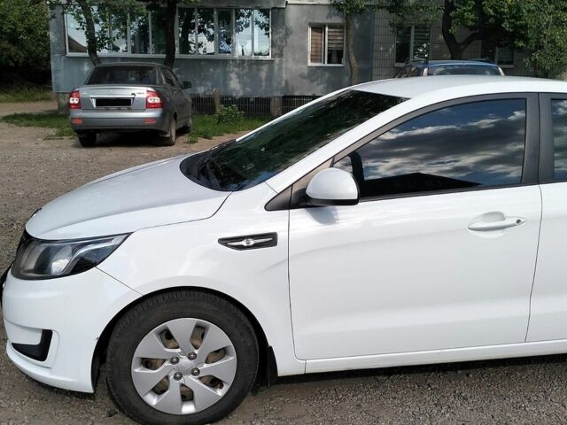 Білий Кіа Ріо, об'ємом двигуна 1.4 л та пробігом 84 тис. км за 8200 $, фото 6 на Automoto.ua