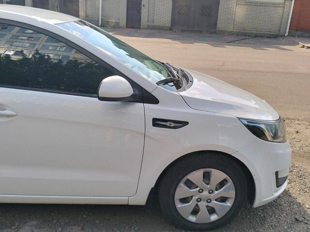 Білий Кіа Ріо, об'ємом двигуна 1.4 л та пробігом 84 тис. км за 8200 $, фото 7 на Automoto.ua