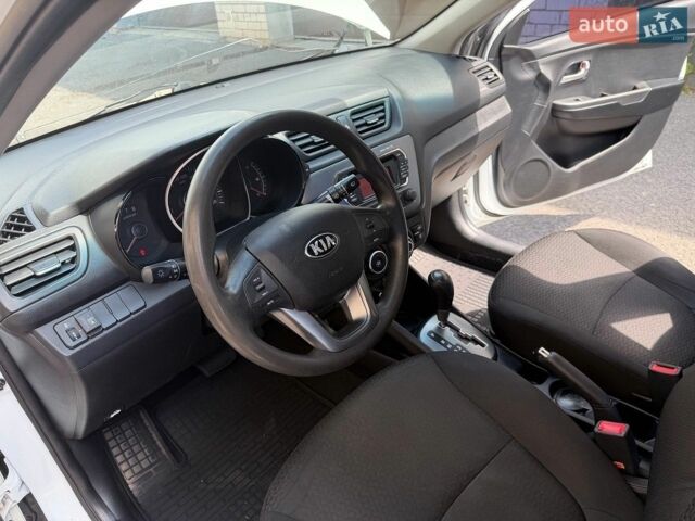 Белый Киа Рио, объемом двигателя 1.4 л и пробегом 143 тыс. км за 9199 $, фото 9 на Automoto.ua