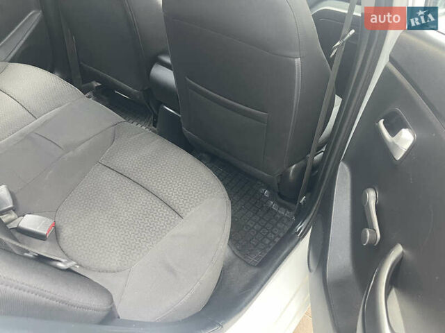Білий Кіа Ріо, об'ємом двигуна 1.4 л та пробігом 141 тис. км за 6500 $, фото 10 на Automoto.ua