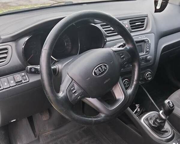 Белый Киа Рио, объемом двигателя 1.59 л и пробегом 102 тыс. км за 3700 $, фото 6 на Automoto.ua