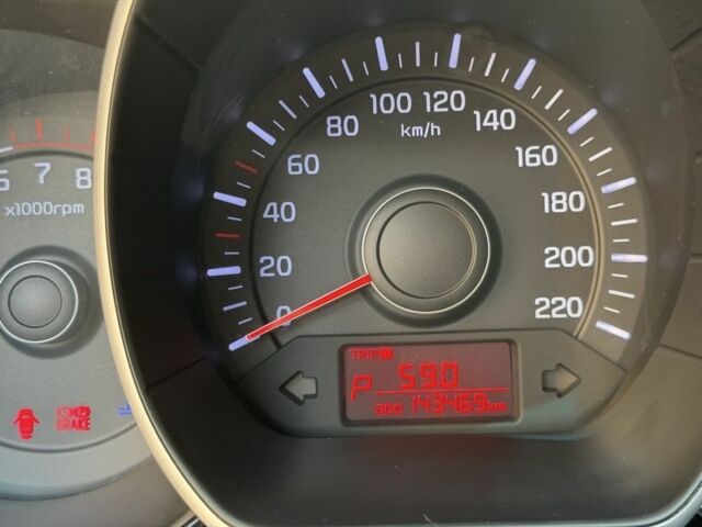 Белый Киа Рио, объемом двигателя 1.4 л и пробегом 143 тыс. км за 8917 $, фото 4 на Automoto.ua