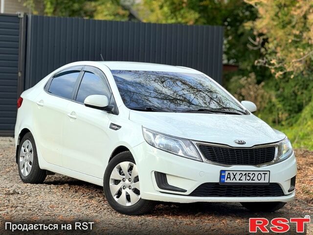 Белый Киа Рио, объемом двигателя 1.6 л и пробегом 255 тыс. км за 6200 $, фото 1 на Automoto.ua
