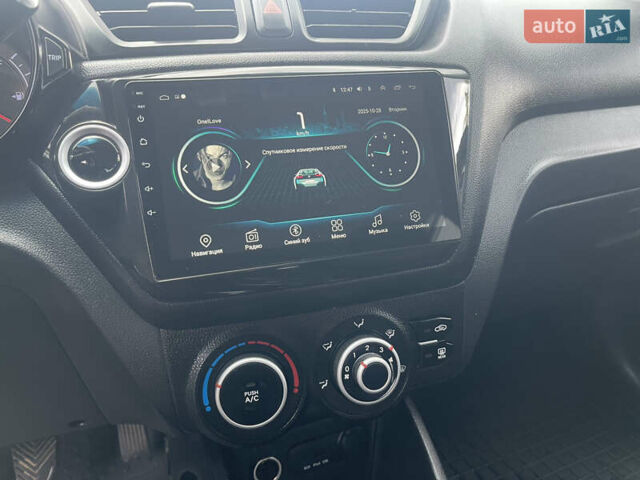 Білий Кіа Ріо, об'ємом двигуна 1.4 л та пробігом 141 тис. км за 6500 $, фото 15 на Automoto.ua