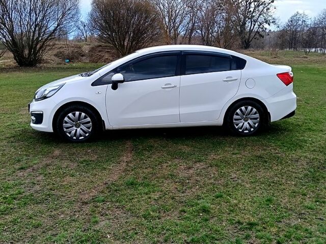 Білий Кіа Ріо, об'ємом двигуна 1.4 л та пробігом 137 тис. км за 6400 $, фото 4 на Automoto.ua