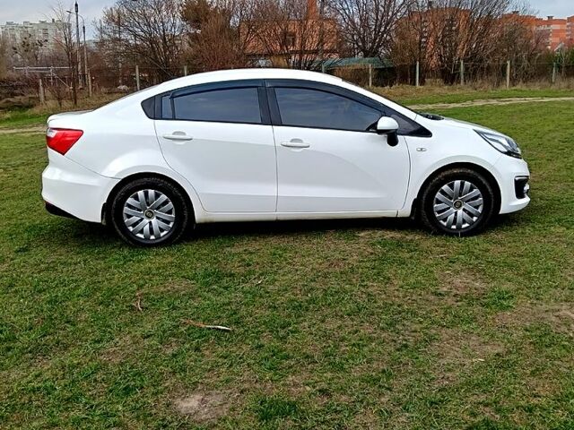 Білий Кіа Ріо, об'ємом двигуна 1.4 л та пробігом 137 тис. км за 6400 $, фото 3 на Automoto.ua