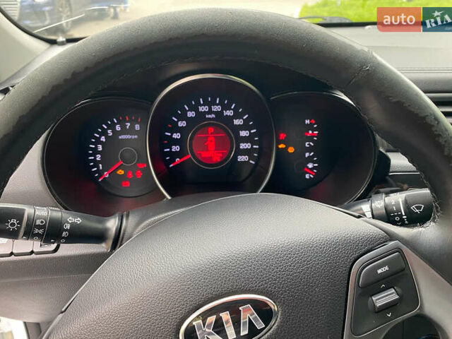 Білий Кіа Ріо, об'ємом двигуна 1.4 л та пробігом 155 тис. км за 11100 $, фото 1 на Automoto.ua