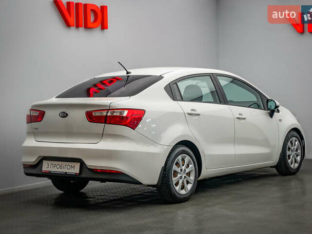 Білий Кіа Ріо, об'ємом двигуна 1.4 л та пробігом 193 тис. км за 9864 $, фото 1 на Automoto.ua