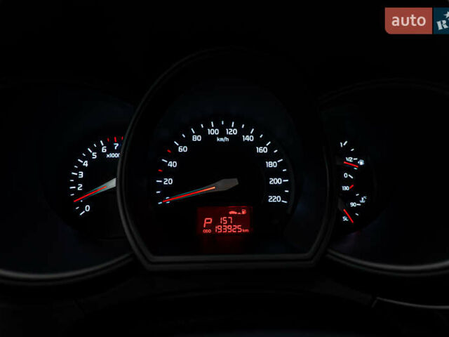 Білий Кіа Ріо, об'ємом двигуна 1.4 л та пробігом 193 тис. км за 9864 $, фото 12 на Automoto.ua