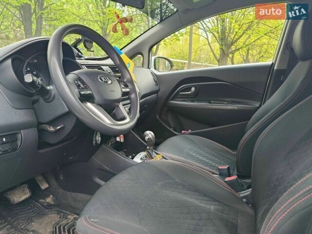 Білий Кіа Ріо, об'ємом двигуна 1.59 л та пробігом 133 тис. км за 7600 $, фото 8 на Automoto.ua