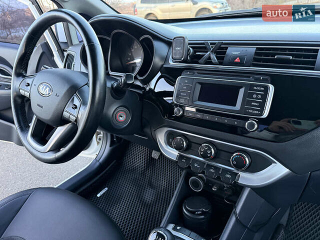 Білий Кіа Ріо, об'ємом двигуна 1.4 л та пробігом 132 тис. км за 9300 $, фото 12 на Automoto.ua