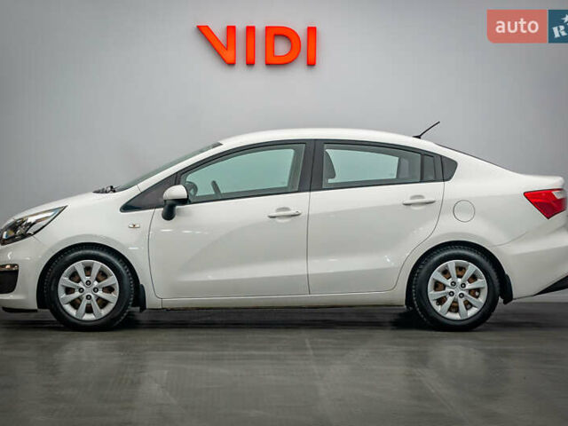 Білий Кіа Ріо, об'ємом двигуна 1.4 л та пробігом 193 тис. км за 9864 $, фото 2 на Automoto.ua