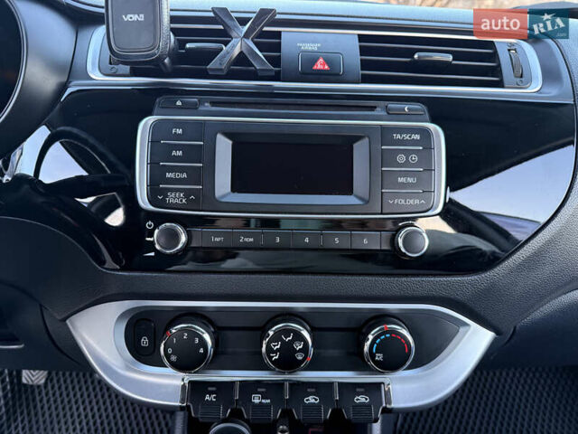 Білий Кіа Ріо, об'ємом двигуна 1.4 л та пробігом 132 тис. км за 9300 $, фото 13 на Automoto.ua