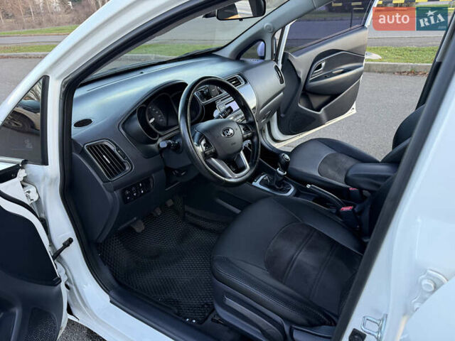 Білий Кіа Ріо, об'ємом двигуна 1.4 л та пробігом 132 тис. км за 9300 $, фото 10 на Automoto.ua