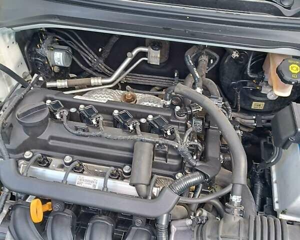 Белый Киа Рио, объемом двигателя 1.4 л и пробегом 21 тыс. км за 10700 $, фото 7 на Automoto.ua