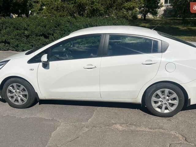 Білий Кіа Ріо, об'ємом двигуна 1.4 л та пробігом 49 тис. км за 10300 $, фото 1 на Automoto.ua