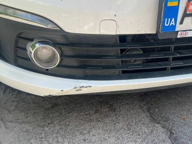 Білий Кіа Ріо, об'ємом двигуна 1.4 л та пробігом 49 тис. км за 10300 $, фото 7 на Automoto.ua