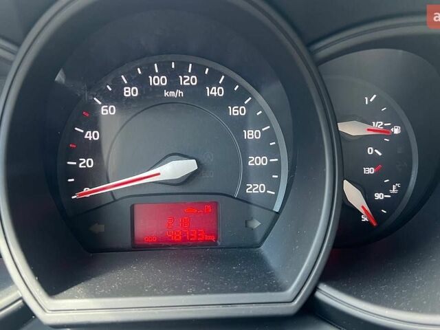 Білий Кіа Ріо, об'ємом двигуна 1.4 л та пробігом 49 тис. км за 10300 $, фото 5 на Automoto.ua