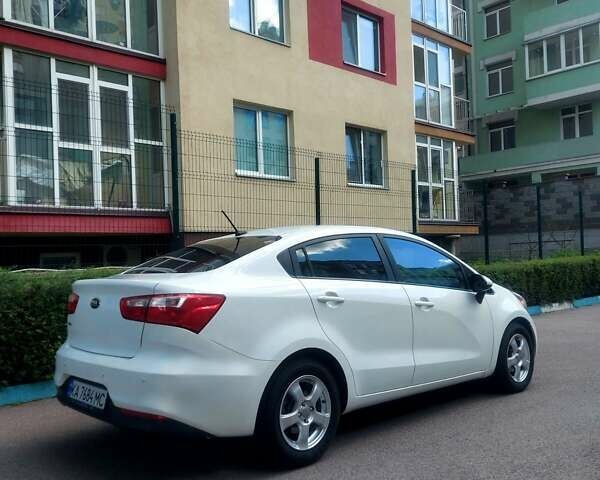 Білий Кіа Ріо, об'ємом двигуна 1.6 л та пробігом 97 тис. км за 8990 $, фото 4 на Automoto.ua