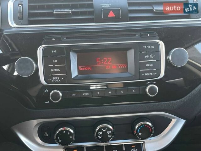 Білий Кіа Ріо, об'ємом двигуна 1.4 л та пробігом 88 тис. км за 8490 $, фото 14 на Automoto.ua