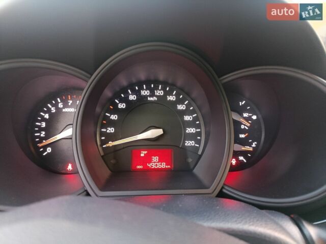 Білий Кіа Ріо, об'ємом двигуна 1.4 л та пробігом 49 тис. км за 10600 $, фото 31 на Automoto.ua