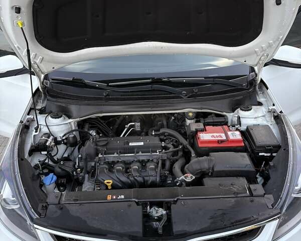 Білий Кіа Ріо, об'ємом двигуна 1.59 л та пробігом 125 тис. км за 13700 $, фото 11 на Automoto.ua