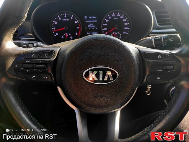 Белый Киа Рио, объемом двигателя 1.6 л и пробегом 144 тыс. км за 11999 $, фото 4 на Automoto.ua
