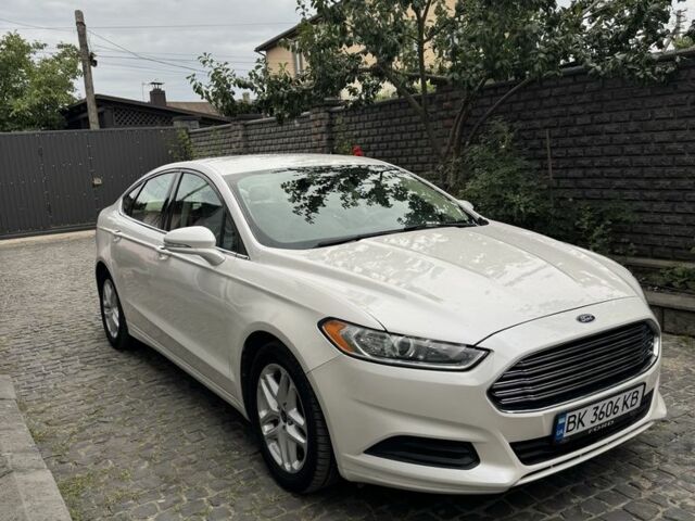 Білий Кіа Ріо, об'ємом двигуна 1.6 л та пробігом 144 тис. км за 12999 $, фото 6 на Automoto.ua