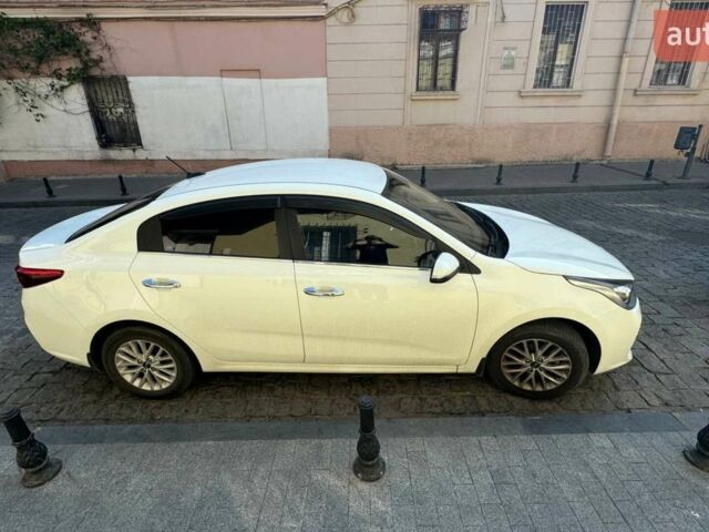 Білий Кіа Ріо, об'ємом двигуна 1.59 л та пробігом 90 тис. км за 13950 $, фото 4 на Automoto.ua