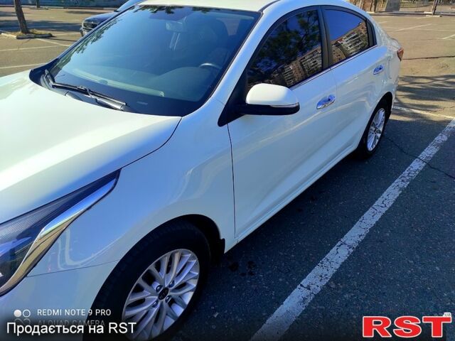 Белый Киа Рио, объемом двигателя 1.6 л и пробегом 144 тыс. км за 11999 $, фото 1 на Automoto.ua