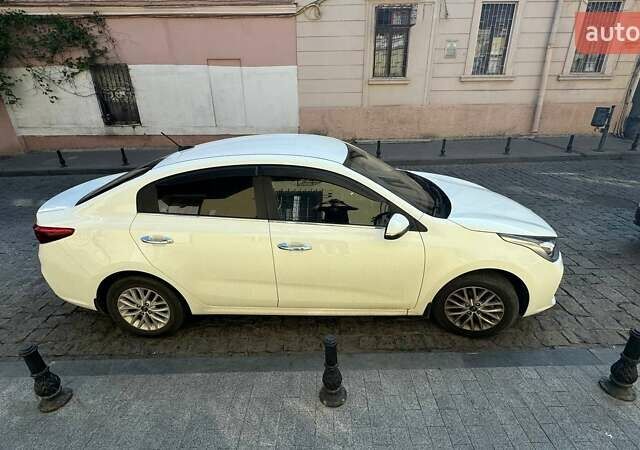 Білий Кіа Ріо, об'ємом двигуна 1.59 л та пробігом 86 тис. км за 13950 $, фото 4 на Automoto.ua