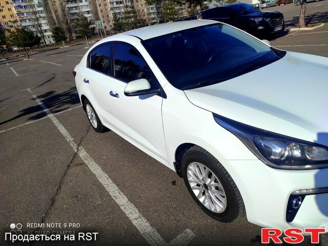 Белый Киа Рио, объемом двигателя 1.6 л и пробегом 144 тыс. км за 11999 $, фото 2 на Automoto.ua