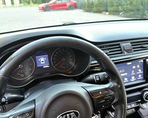 Білий Кіа Ріо, об'ємом двигуна 1.59 л та пробігом 125 тис. км за 13700 $, фото 10 на Automoto.ua