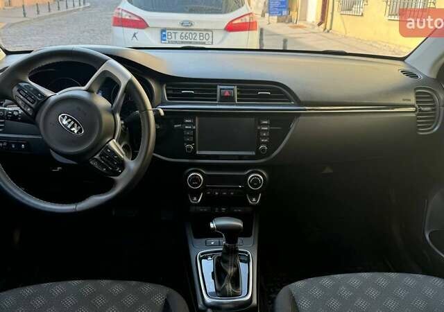 Білий Кіа Ріо, об'ємом двигуна 1.59 л та пробігом 86 тис. км за 13950 $, фото 2 на Automoto.ua