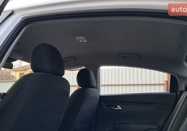 Белый Киа Рио, объемом двигателя 1.59 л и пробегом 70 тыс. км за 13500 $, фото 14 на Automoto.ua