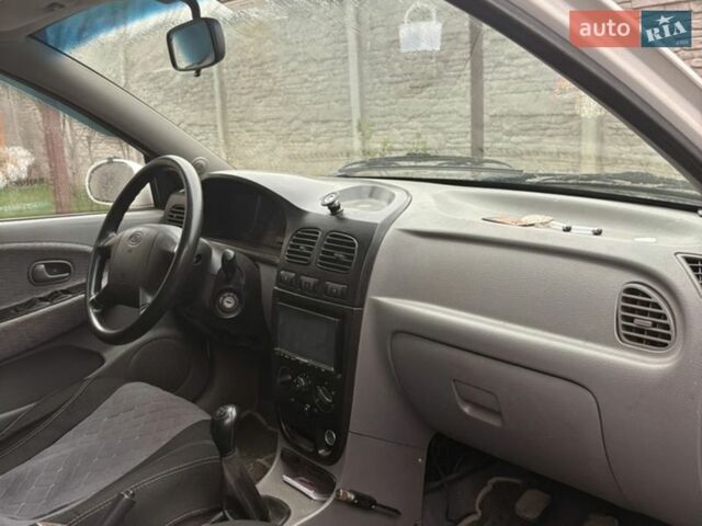 Белый Киа Рио, объемом двигателя 1.5 л и пробегом 260 тыс. км за 2000 $, фото 2 на Automoto.ua