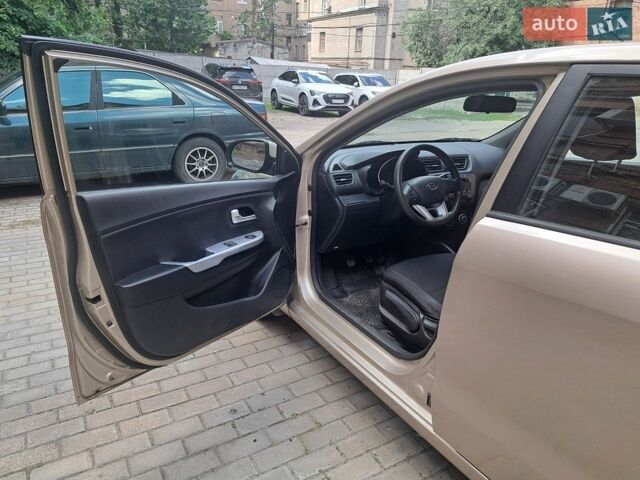 Бежевий Кіа Ріо, об'ємом двигуна 1.4 л та пробігом 145 тис. км за 6500 $, фото 9 на Automoto.ua